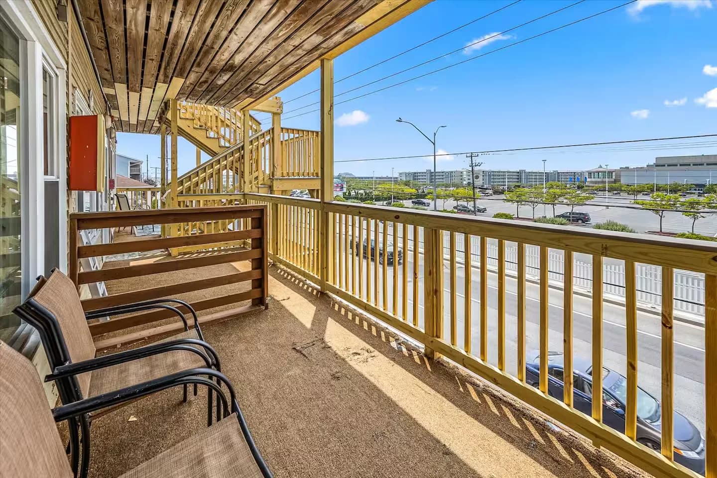 The front deck — table, chairs, and ocean air